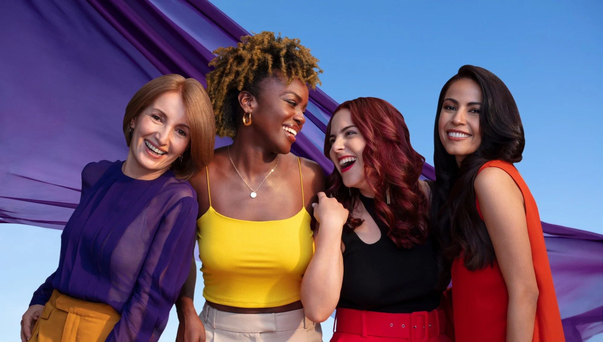 Schwarzkopf campaign: four models together with purple fabric