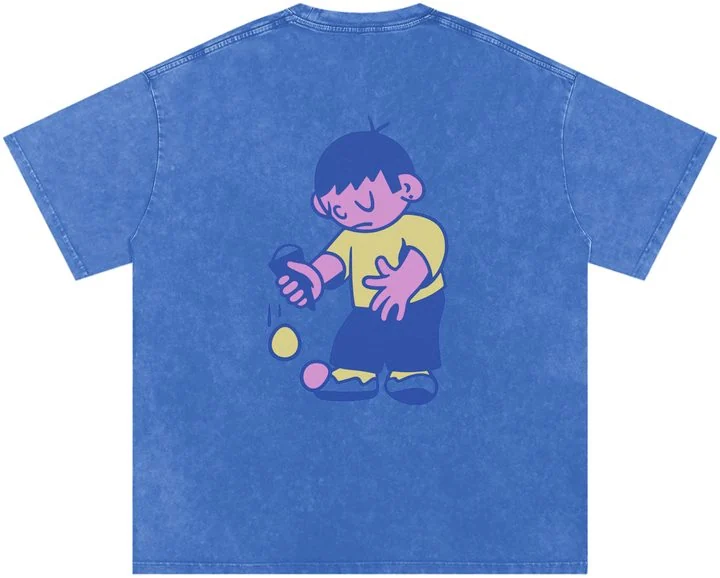 Back of the blue Ice Cream Kid Tee: the kid dribbling ice cream.